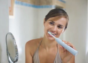 importance proper way to brush teeth with electric toothbrush